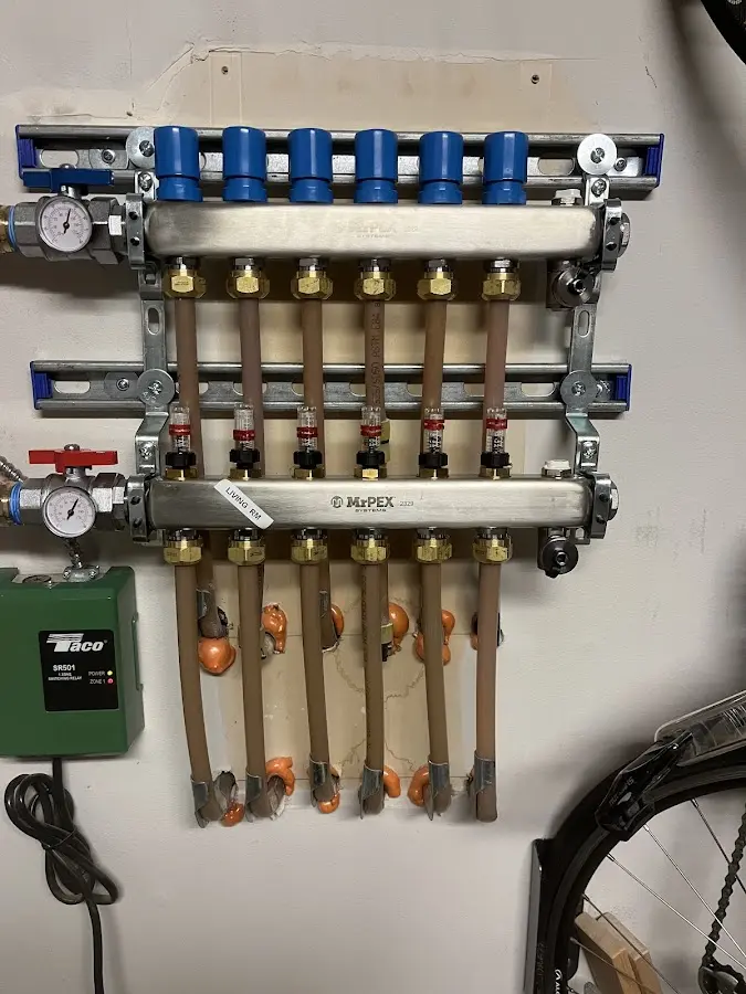 Plumber performing Water Heater Repair at a residential property in Pittsburg